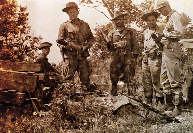 Detachment 101 personnel capture Japanese supply dump.